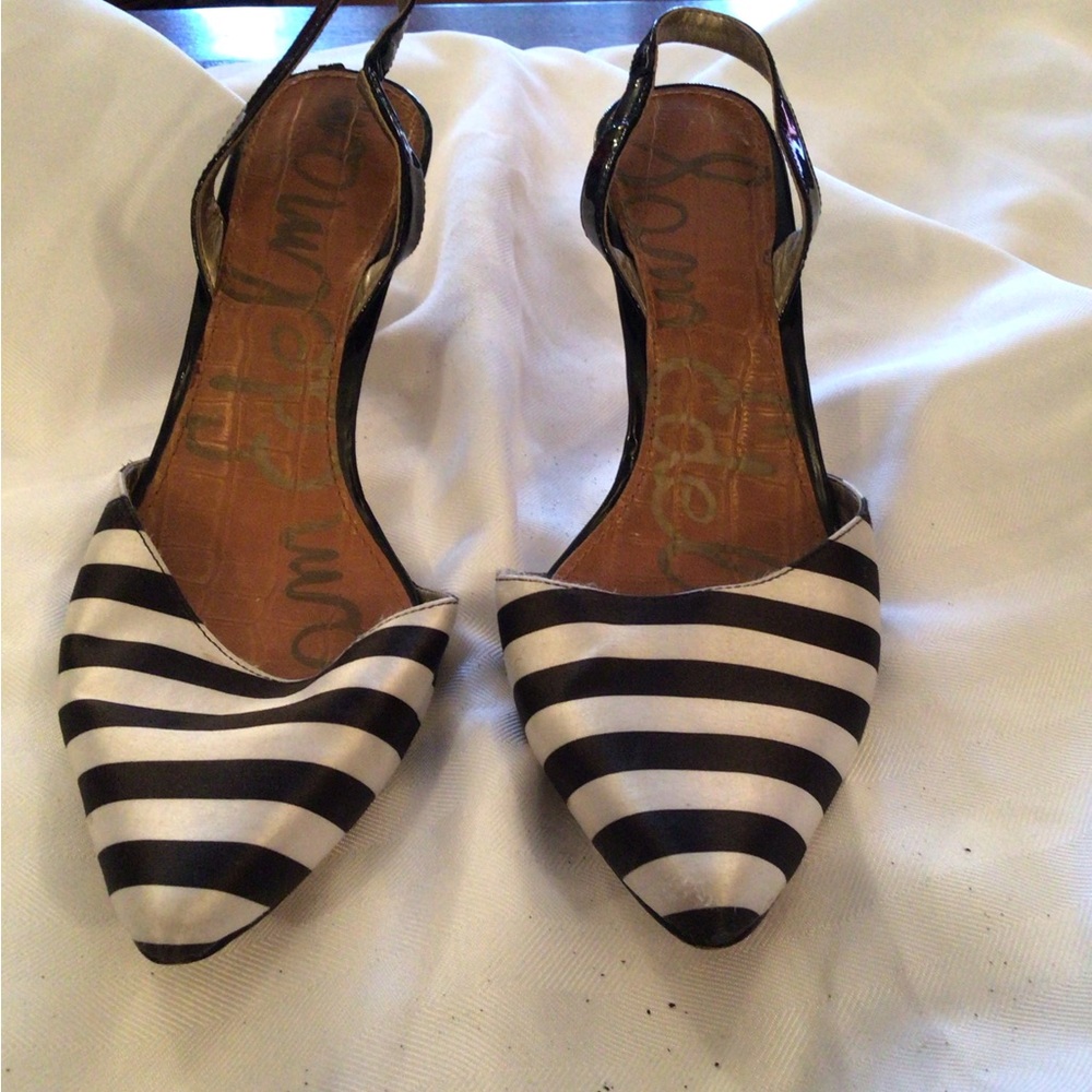 Gently worn black sling back puns